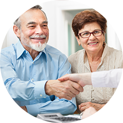 A cheerful couple engages in a handshake