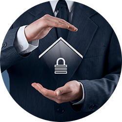 A businessman holds a padlock featuring a house icon