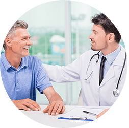 A medical professional speaks with a patient
